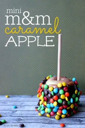 Fun and playful M&M covered caramel apples are perfect for a party or special occasion. Kids literally eat them up!