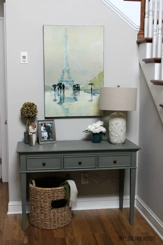 Transforming an entryway from a cluttered, uninviting mess to a beautiful and welcoming space.