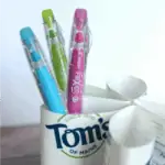 DIY Pen Organizer Toothbrush Hack. Upcycle your toothbrush containers and make your own pen, pencil, and art supply organizer with the toothpaste containers instead of throwing them away!