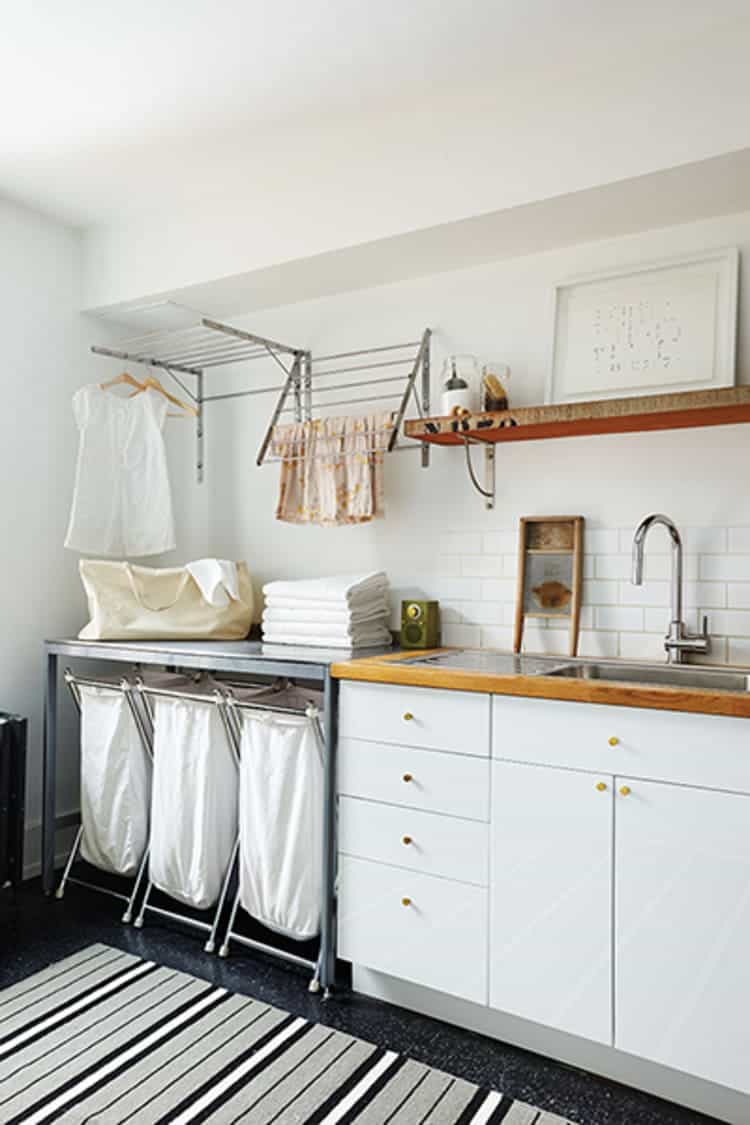 a foldable drying rack for your laundry room walls white laundry room with white cabinets and white foldable laundry baskets