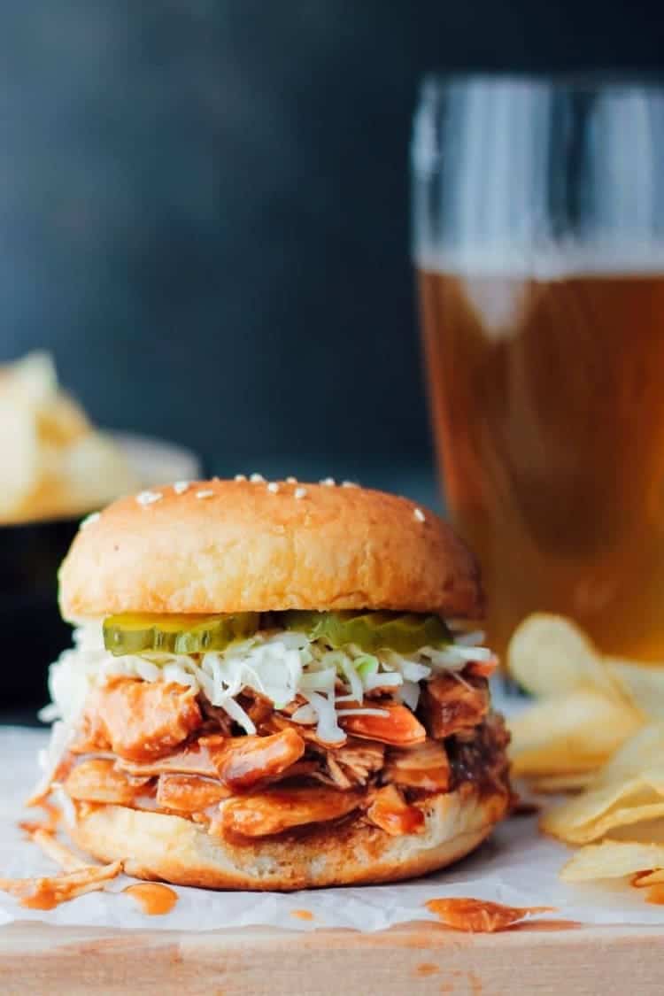 crock-pot bbq shredded chicken in buns in buns with cheese and pickles