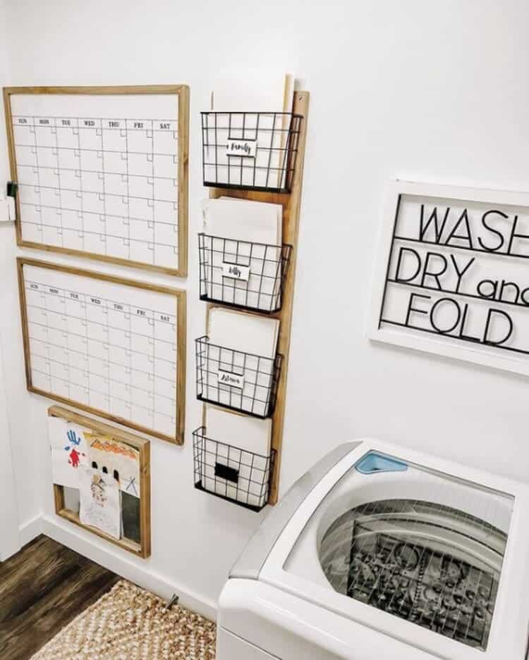 command center with dry erase calendar, wire baskets, pin board perfect for small laundry room organization