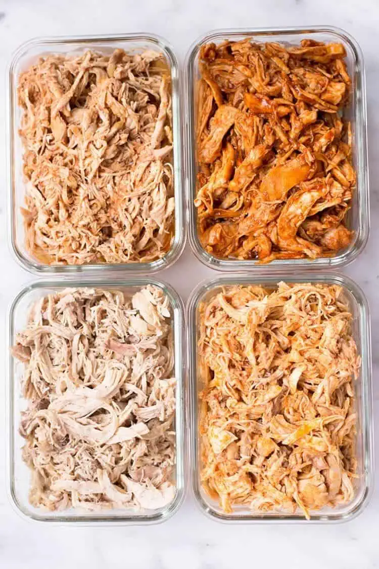 slow cooker chicken shredded 4 ways with different spices and sauces in four containers