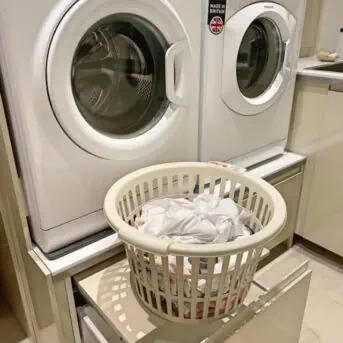 cropped-08-pedestal-drawers-under-washer-and-dryer-with-additional-pull-out-shelves-to-put-laundry-baskets-or-supplies-on.jpg