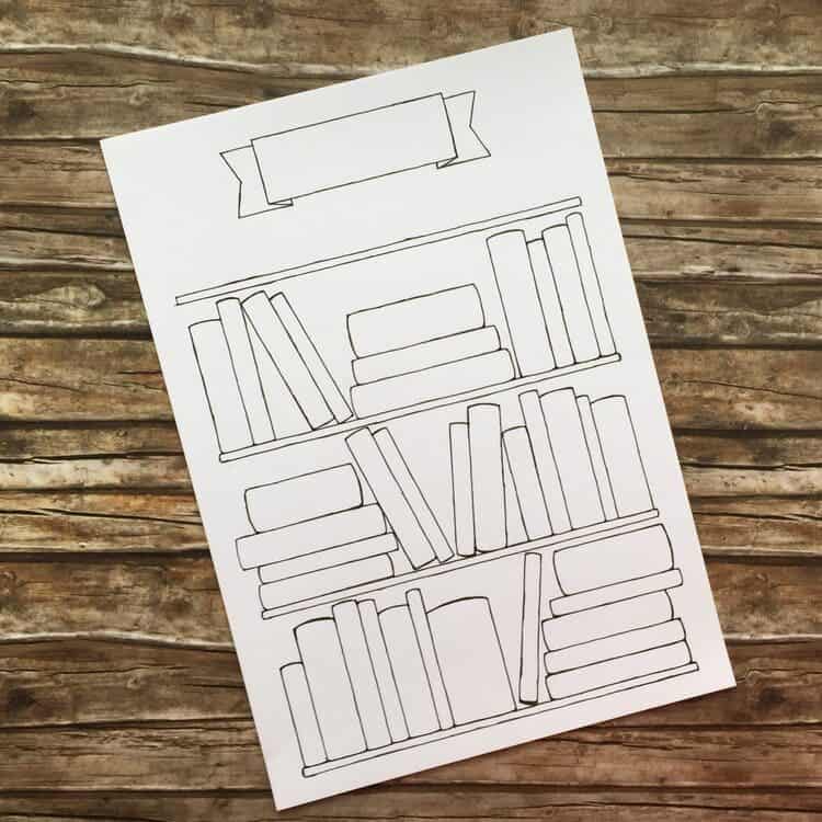 book reading habit tracker printable on a wooden table