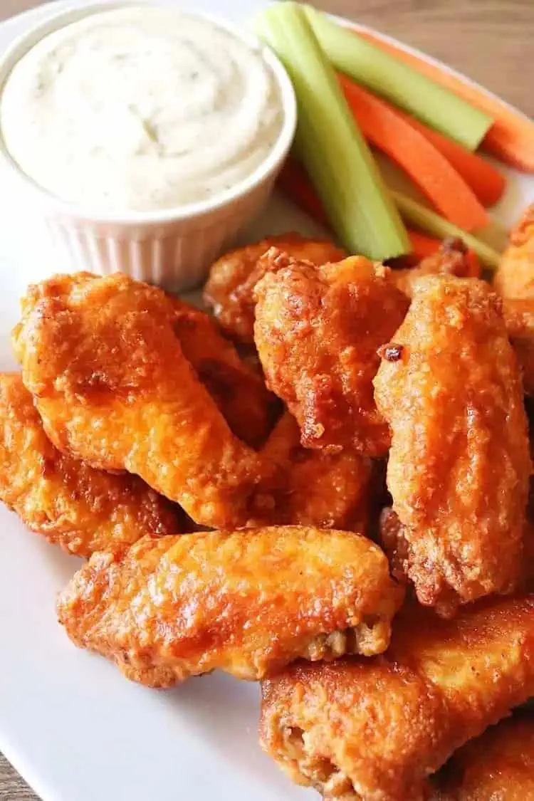 hooters air fryer chicken wings served with dips and veggies