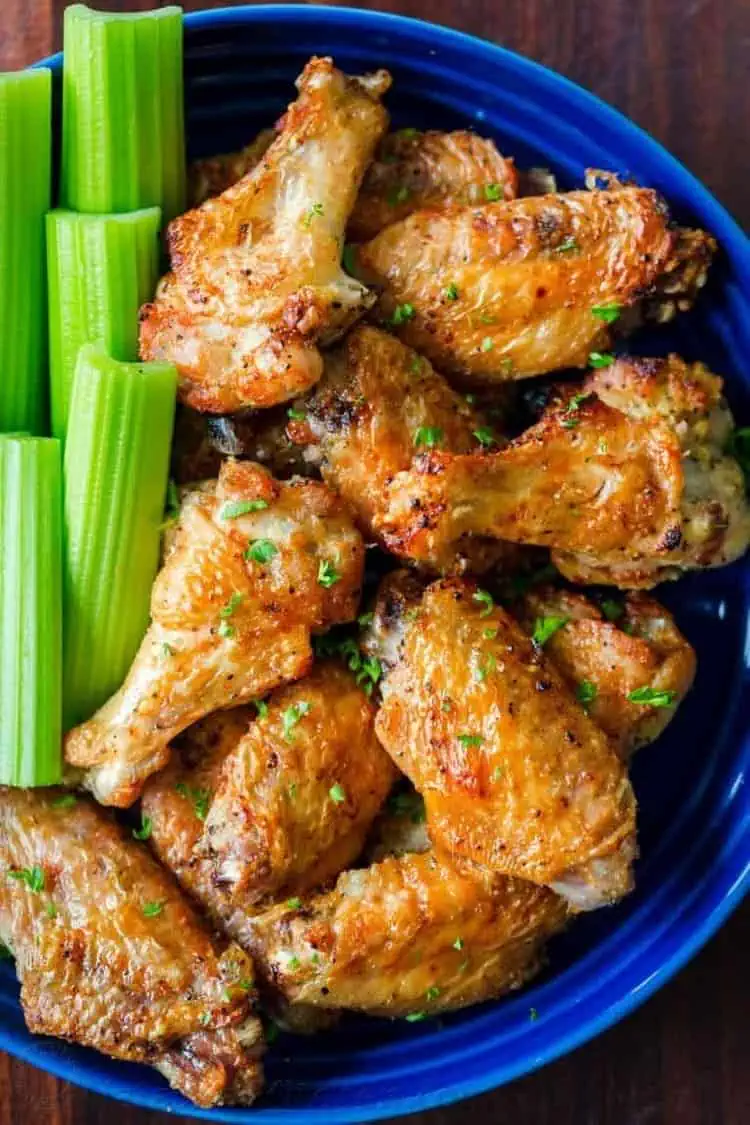 Air Fryer Chicken Wings with crispy, salty skin with garlic and lemon pepper