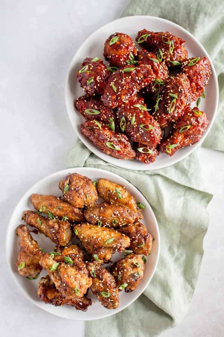 Air Fryer Korean Fried Chicken two plates with different glazing