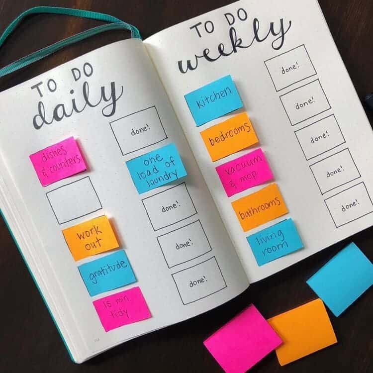 bullet journal with daily and weekly to-do list with post-it notes