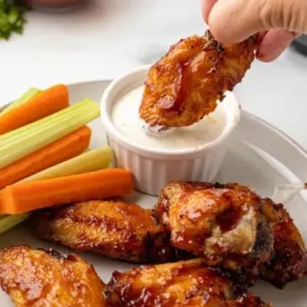 Low Carb Keto Air Fried BBQ Chicken Wings with white sauce dip carrots and celery