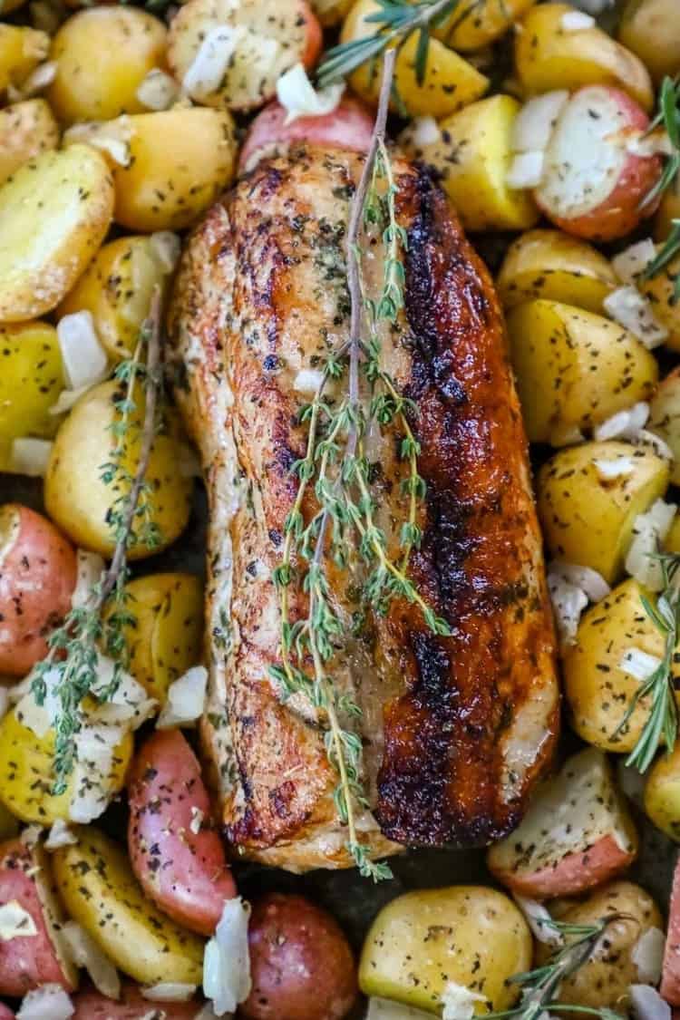 Garlic Herb Butter Baked Pork Loin and Potatoes close photo