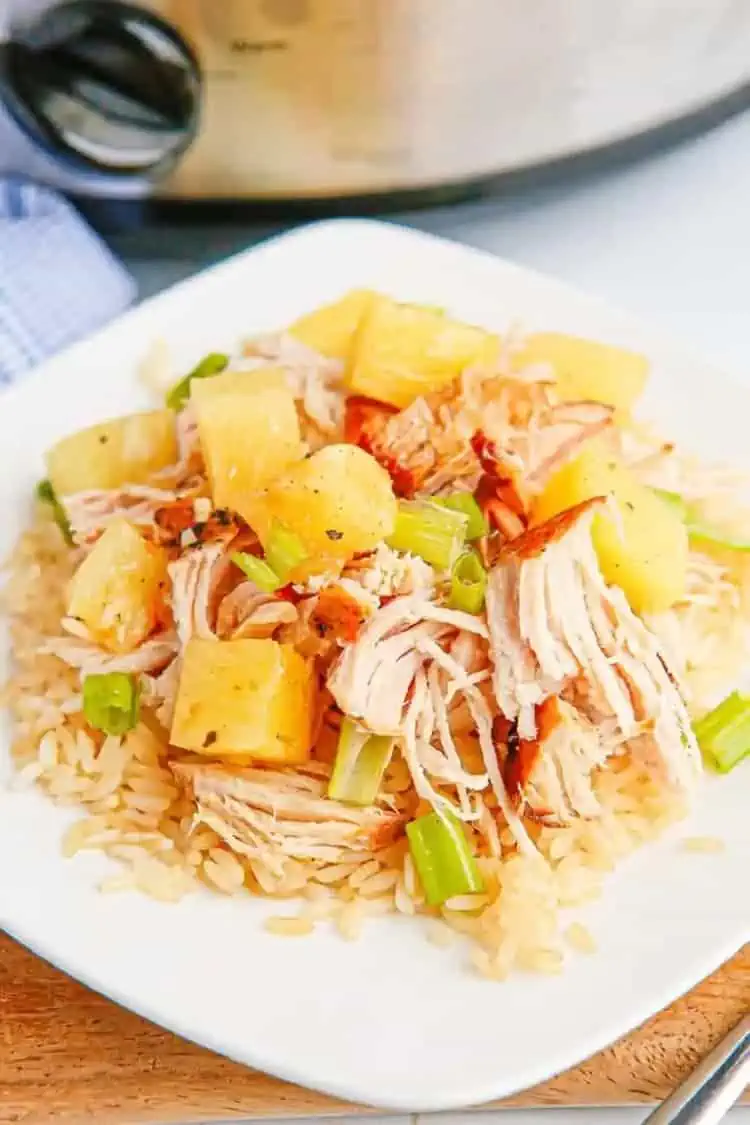 Slow Cooker Pineapple Pork Loin served on rice picky kids favorite