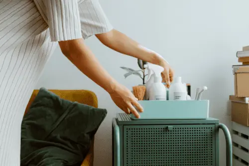 woman organizing products on cart