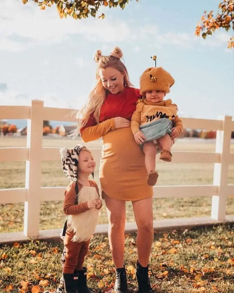 Winnie the Pooh with honey pot and tiger costumes for mom and kids for halloween