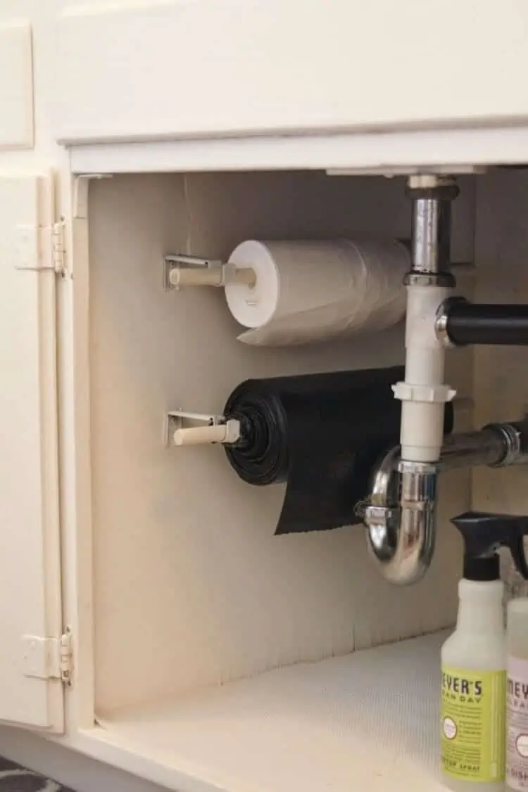 Organize your trash bags under the kitchen sink