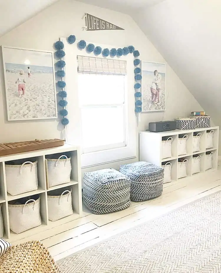 Farmhouse playroom setup with white storage baskets