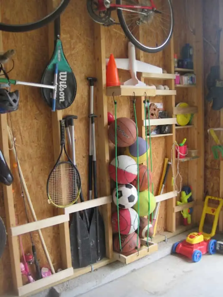Ball Storage With Bungee Cords in a garage