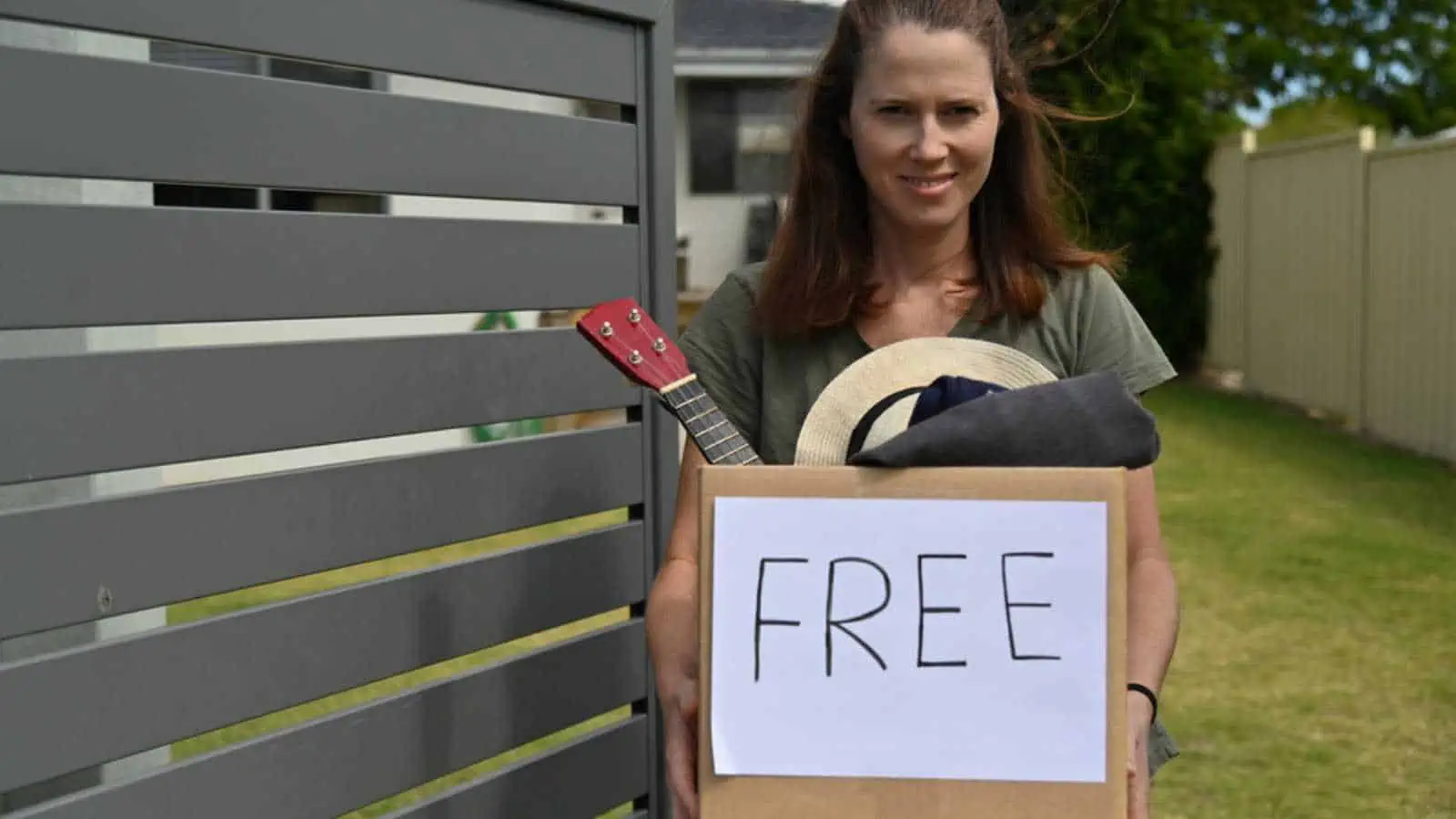 Woman donating household items