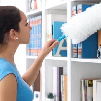 Woman dusting