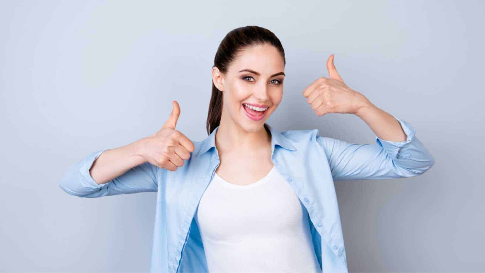 Woman showing thumbs up