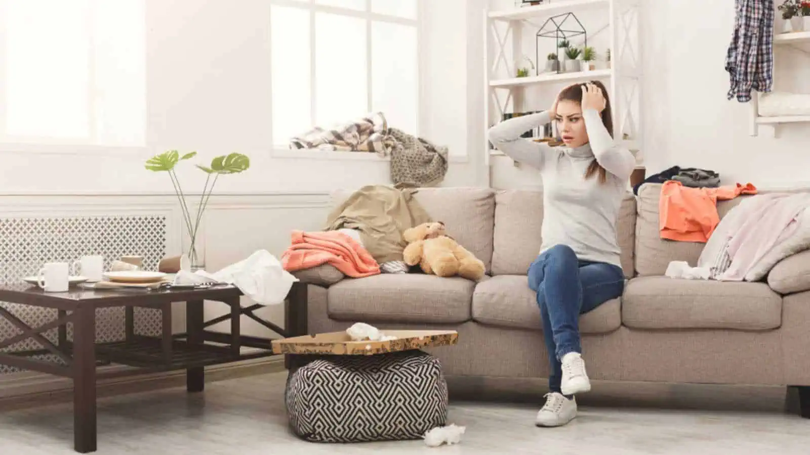 Woman stressed on seeing messy room