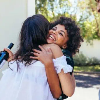Woman welcoming friend