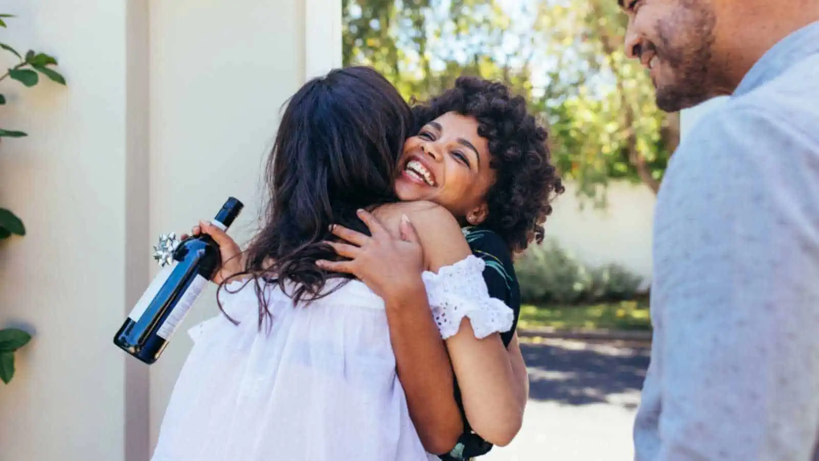 Woman welcoming friend