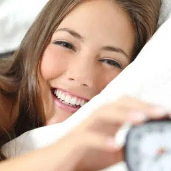 Happy Woman in bed