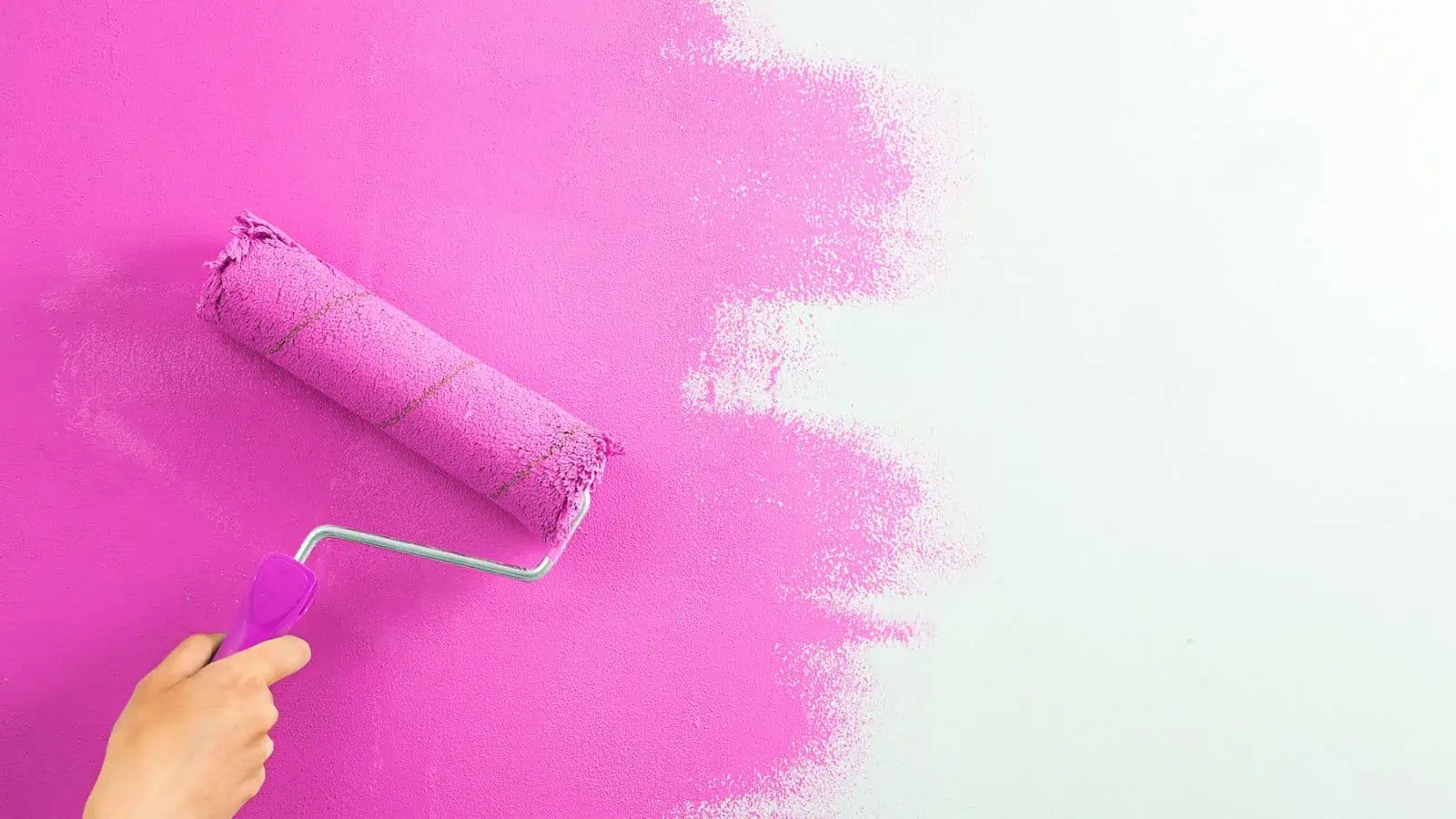 paint roller with pink paint