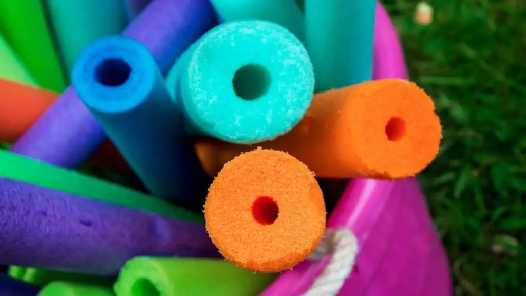 pool noodles in a big bucket