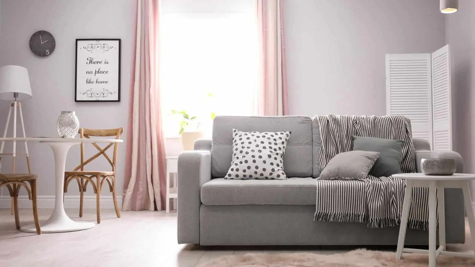 white and gray room with pink curtains