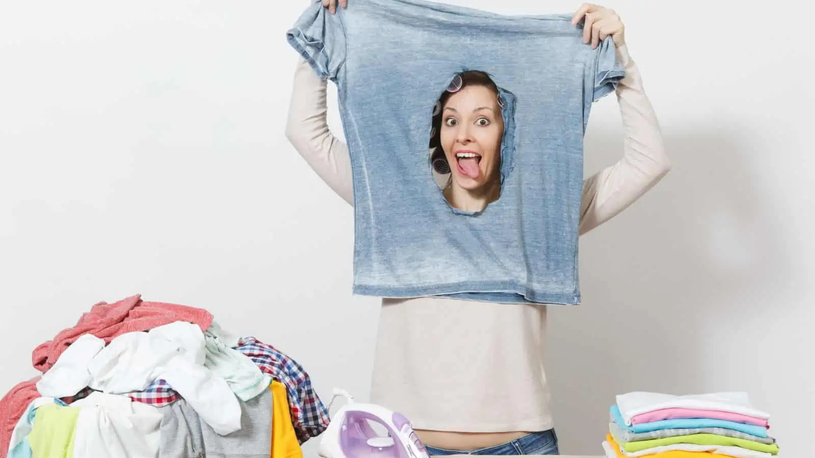 woman peeking through ripped tshirt