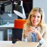 professional woman sitting at table