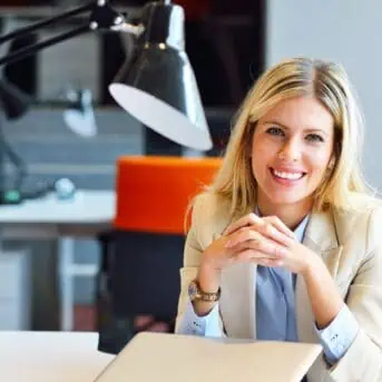 professional woman sitting at table