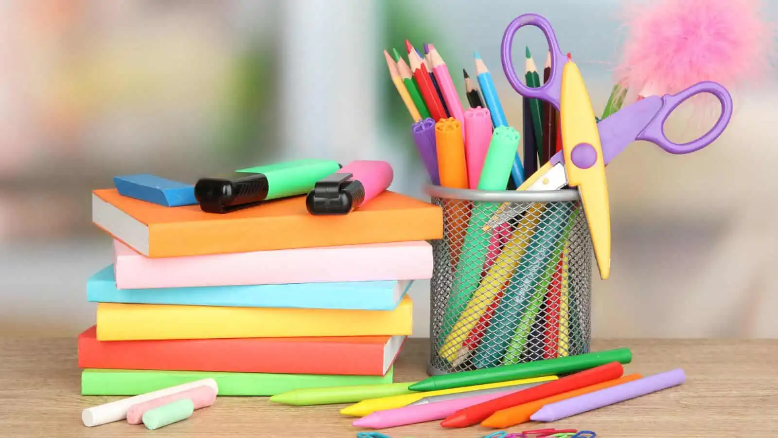 school supplies including chalk notebooks markers crayons highlighters scissors