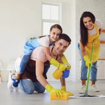 Funny family cleans the house