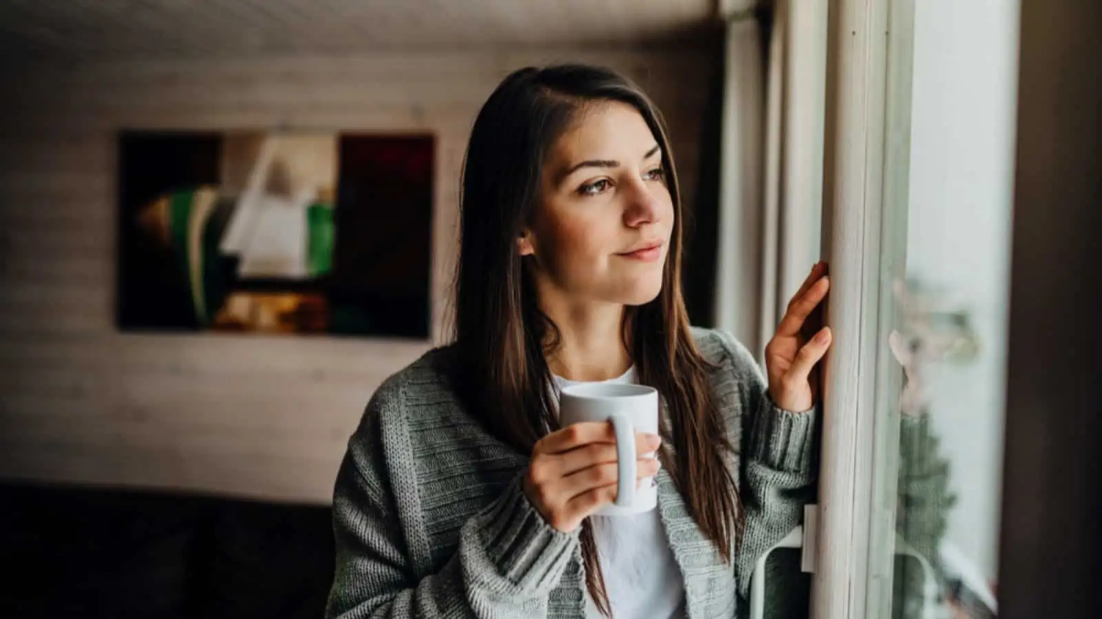 Woman having cup of coffee