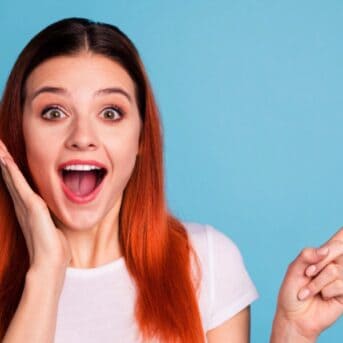 Woman surprised and pointing something