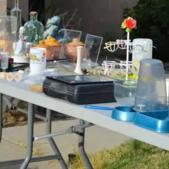 table of stuff for sale at a garage sale