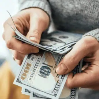 woman holding money