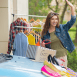friendly woman at garage sale waving hello