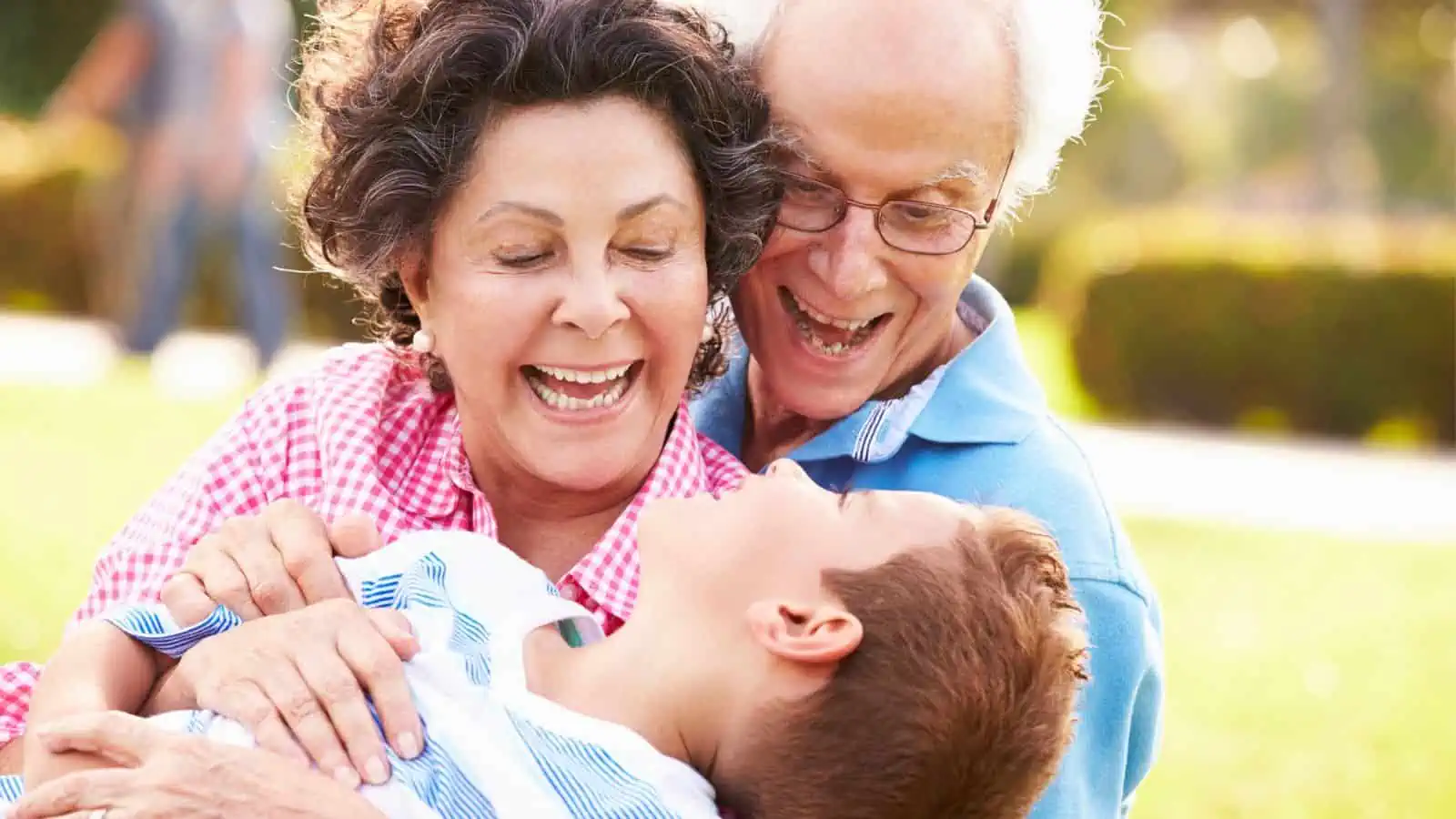 grandparents playing with grandson