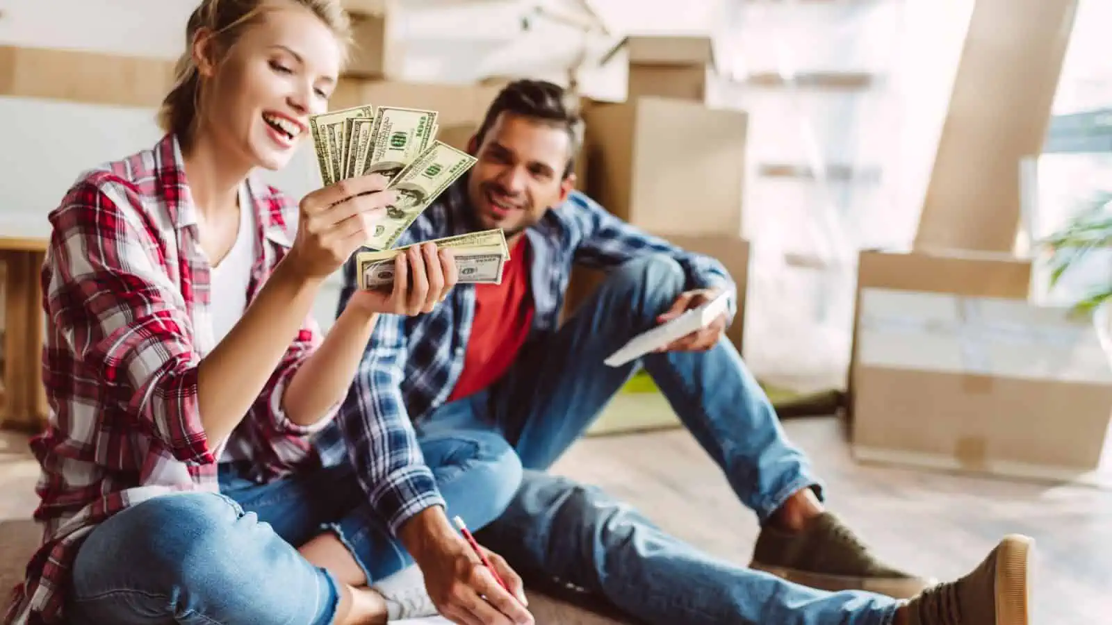 happy couple counting money