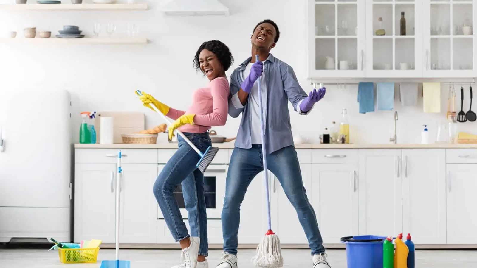 happy couple singing and cleaning