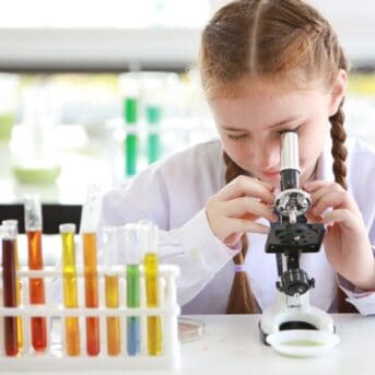 young girl doing a science experimeny