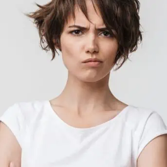 woman looking irritated