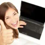 woman on laptop giving thumbs up