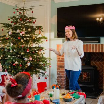 family playing game on Christmas