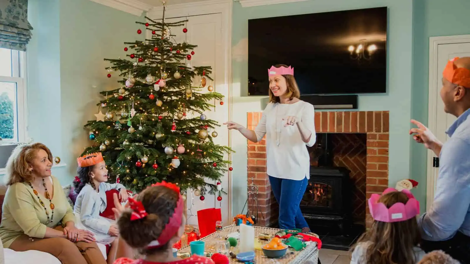 family playing game on Christmas