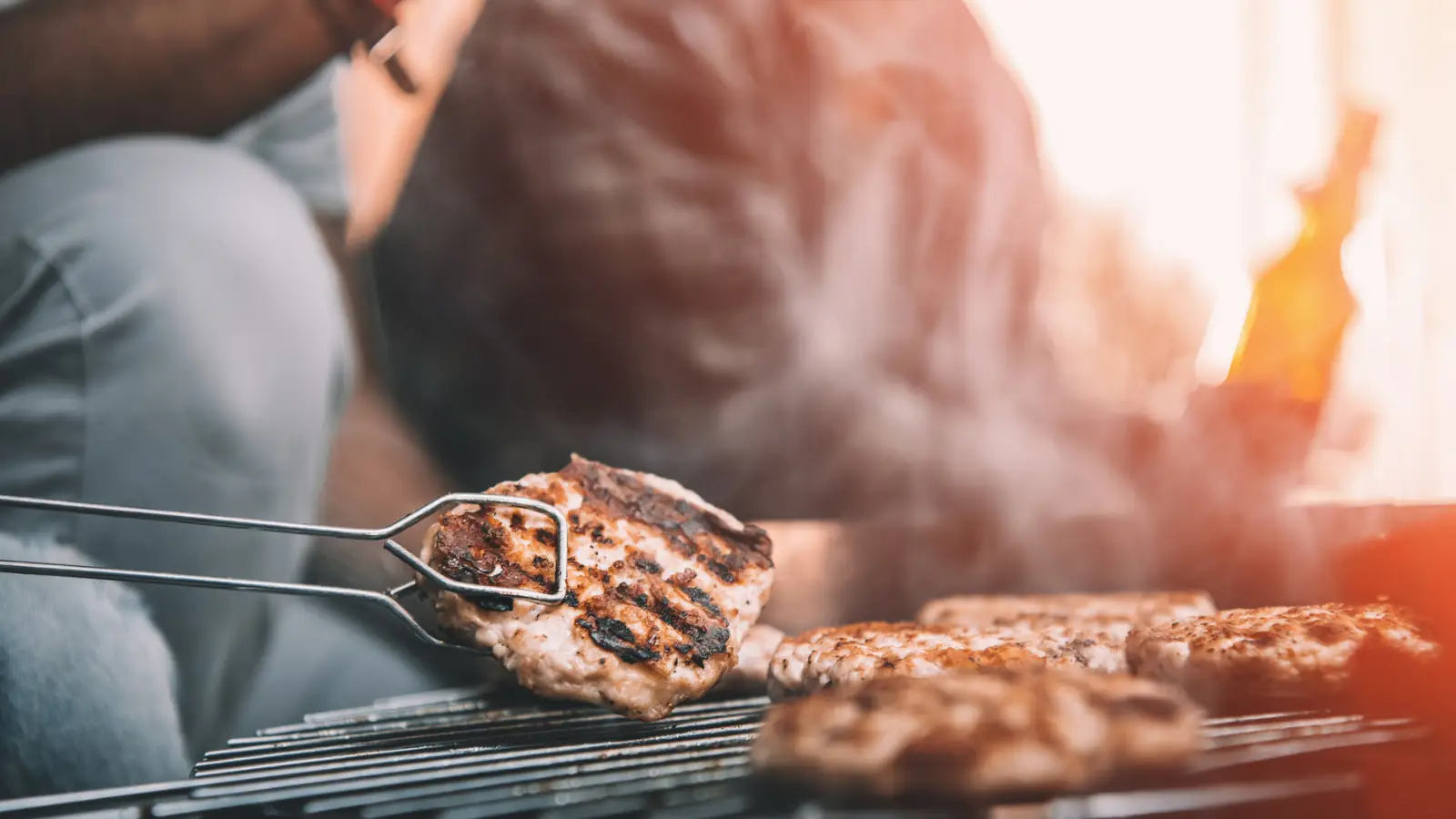 chicken cooking on a grill